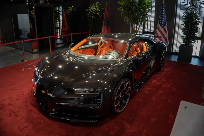 My photograph of a black Bugatti with an orange interior
